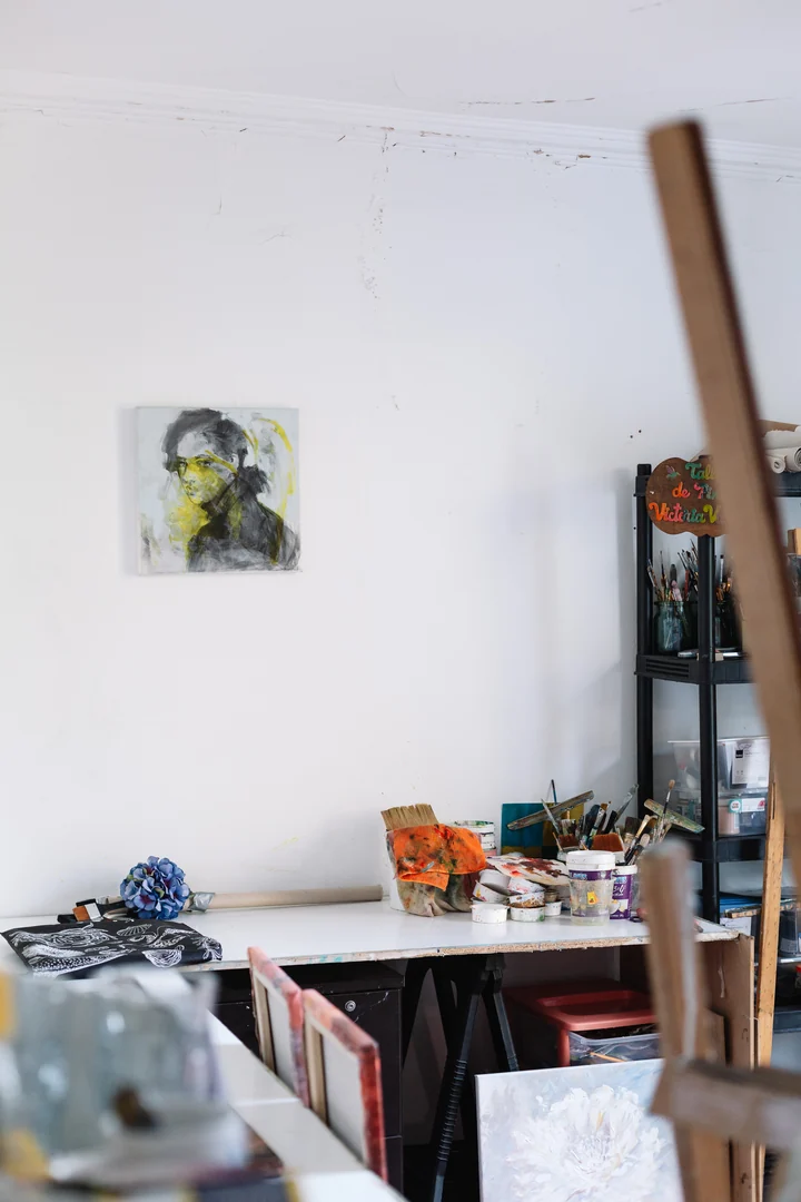 A painting, brushes and a worktable in Victoria Valjalo’s studio.